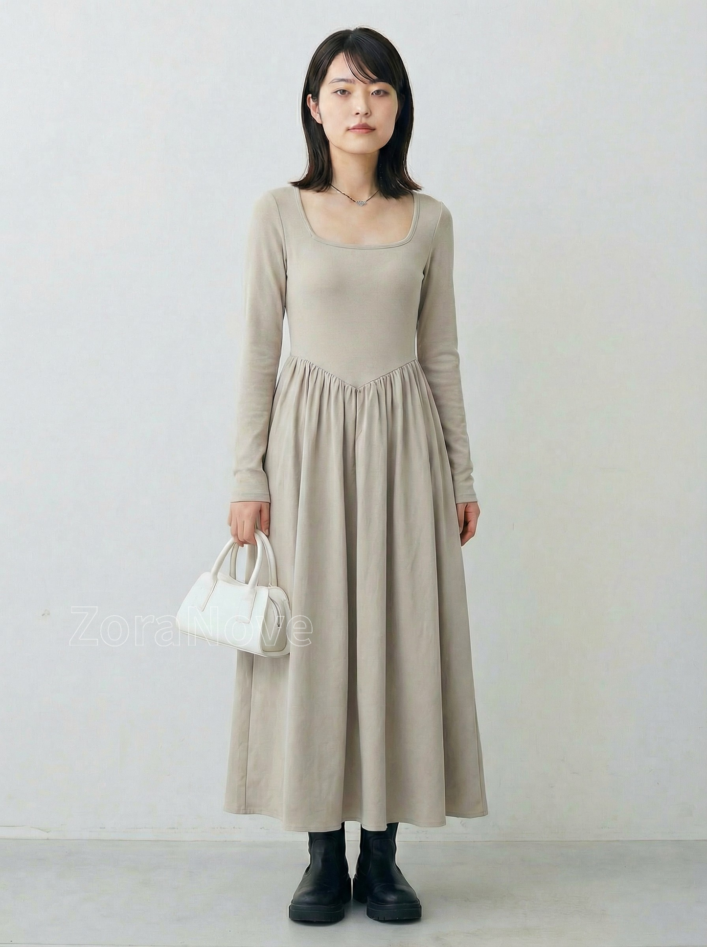 方領修身剪裁＋下擺大擺針織連身裙